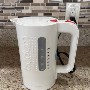 Bodum Cream Electric Kettle with Red Accents